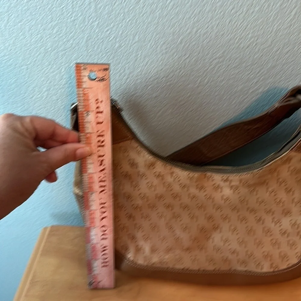 Dooney and Bourke classic monogram canvas and leather Tan color small hobo bag